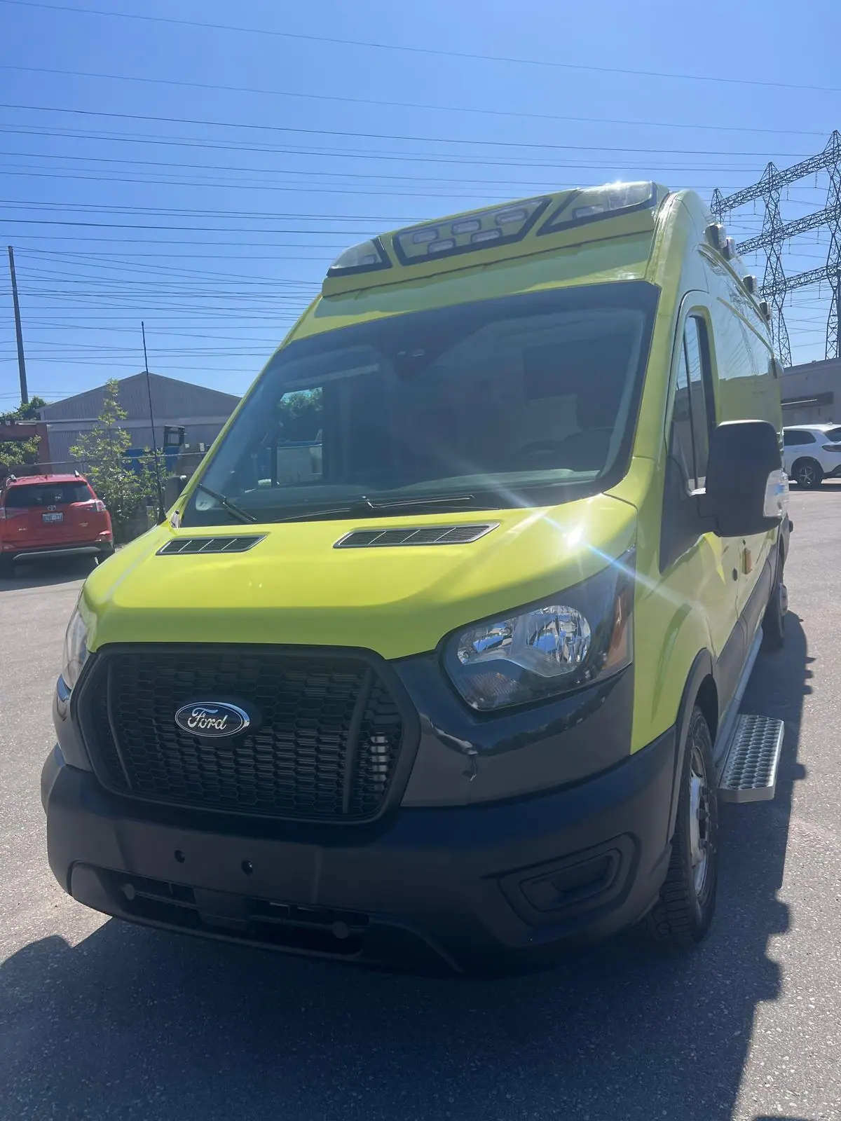 High-visibility yellow Ford Transit 350 HD